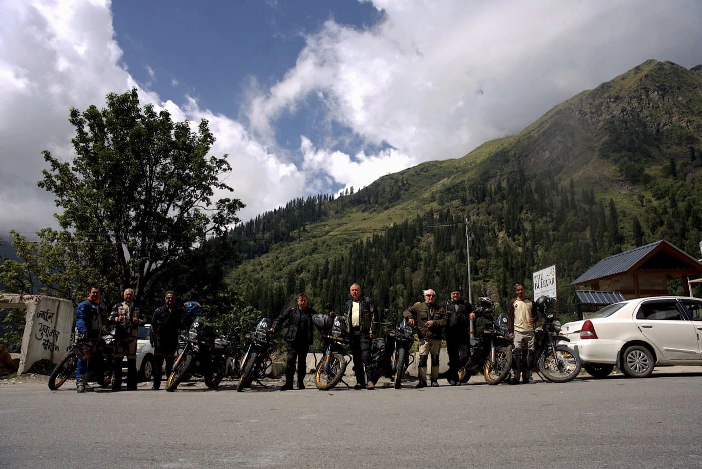 Offhorizon Adventures riders with their Royal Enfield Himalayan 450 motorcycles before leaving Manali on Day 3
