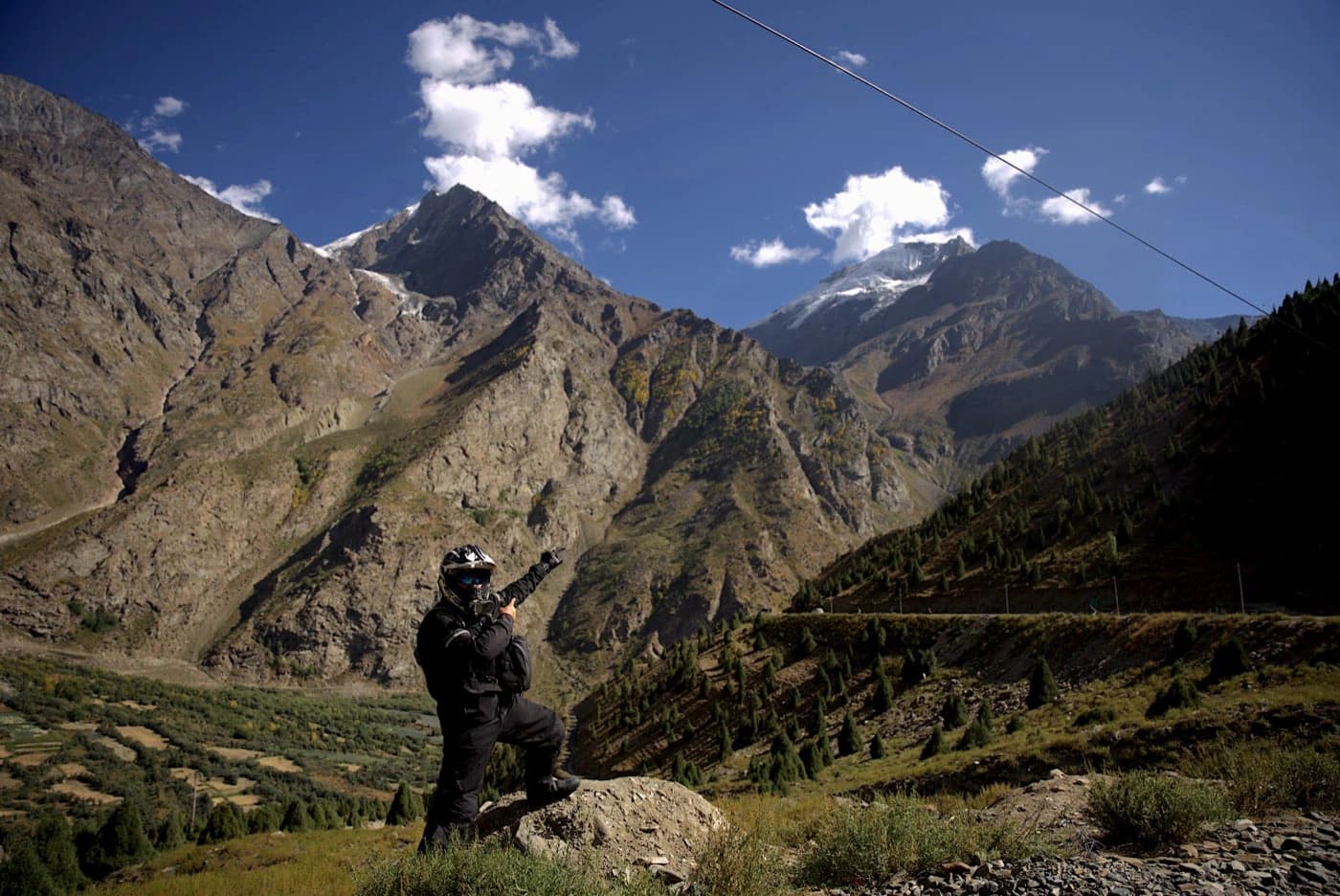 Rider looking out over the Bhaga valley near Jispa at the end of Day 3