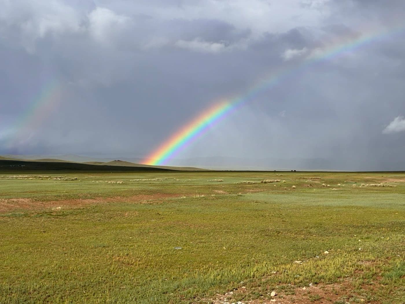 Rainbow over the open steppe in Mongolia