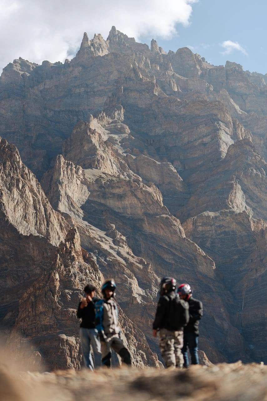 Riders overlooking rugged Zanskar mountains on the Padum to Lamayuru route