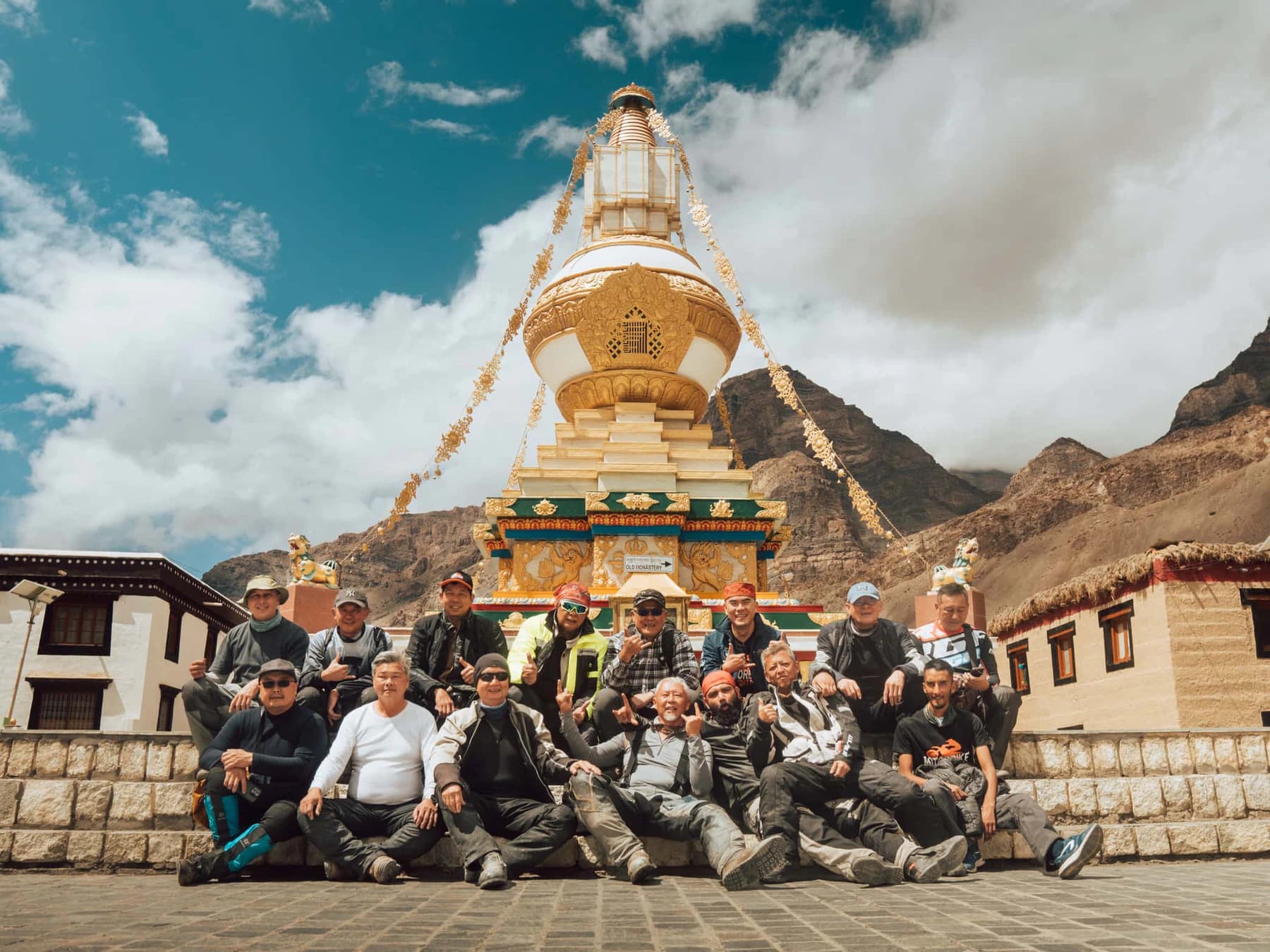 Group posing in front of Tabo Monastery in Spiti Valley